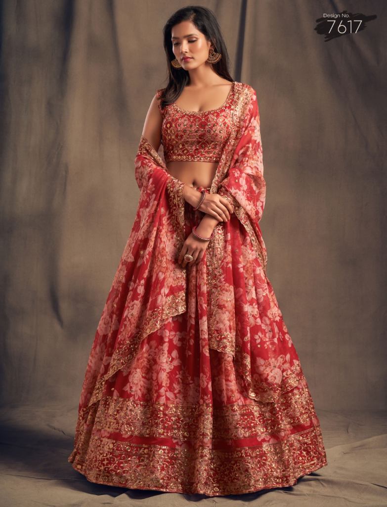 SHYAMAL & BHUMIKA - Nikita in a red Shyamal & Bhumika lehenga, embellished  with floral motifs on her wedding day.⁠ .⁠ Bride: @nikita_gargg⁠ .⁠ # ShyamalBhumika #BridesInShyamalBhumika #Bespoke #Bride #Handcrafted  #RealWedding #IndianWeddings ...